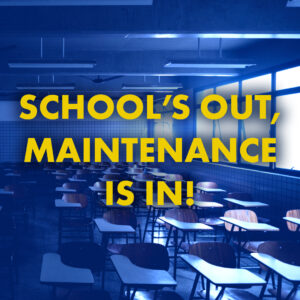 A photo of a dark empty classroom. Transcript: School's Out, Maintenance is In!