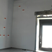 Drive thru window and outlets at a new construction at Guzman y Gomez