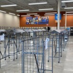 a photo of retail lighting over brand new racks